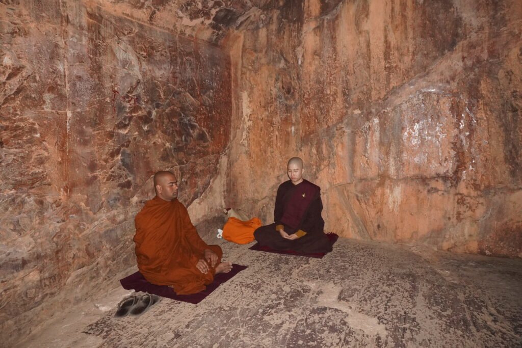 Buddhist bhikshu in meditation in son bhandar cave 