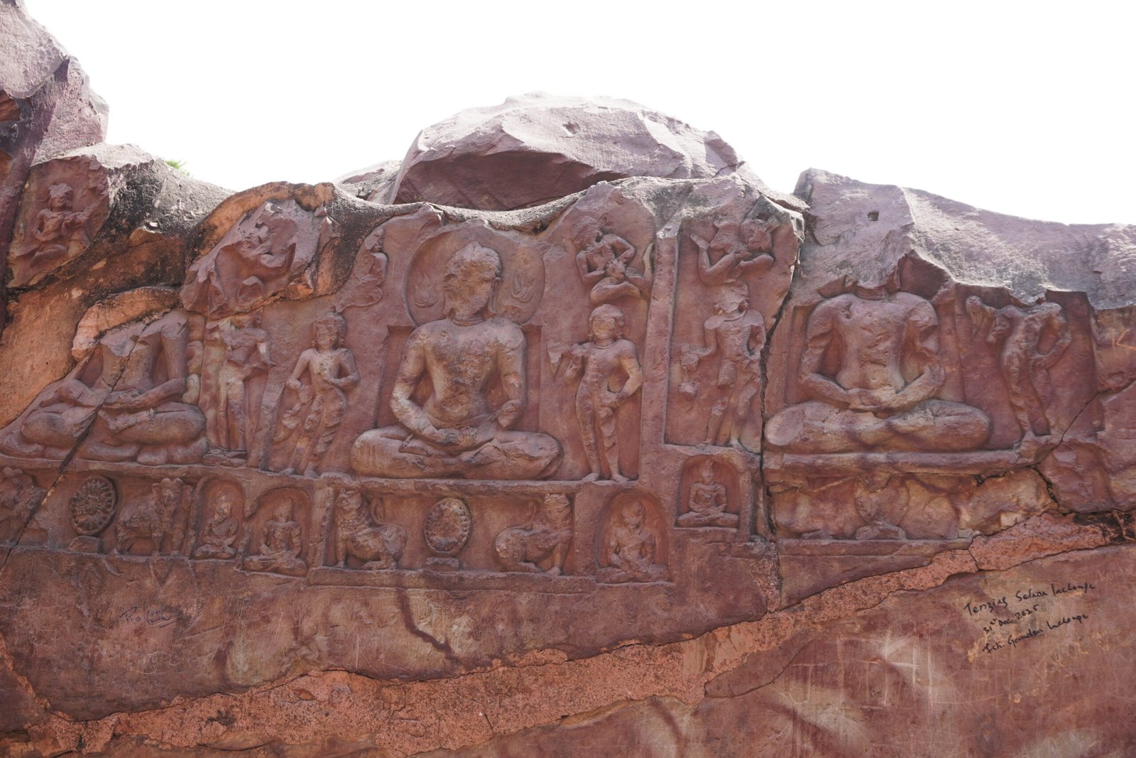 buddhist statue on the wall of the son bhandar cave 