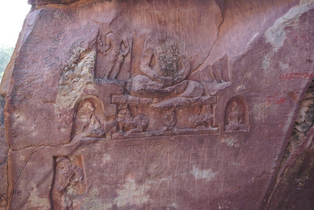 statues on the waal of the son bhandar cave 