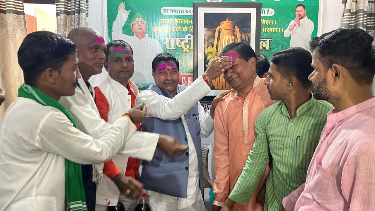 Holi gathering at RJD office; workers spread the message of unity with colours.