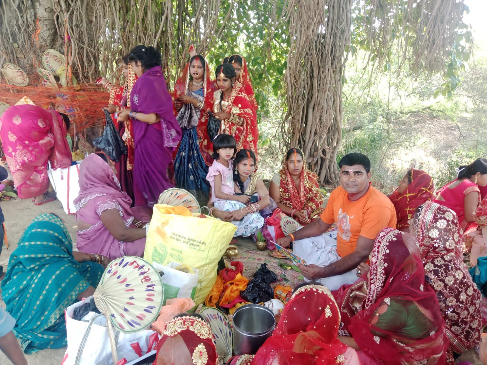 Women's faith in Vat Savitri Puja, circumambulating the banyan tree, prays for the long life of their husbands.