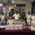 Illegal liquor trade was operating just 300 meters from the police station; 26.625 liters of Indian-Made Foreign Liquor (IMFL) were seized during a raid.